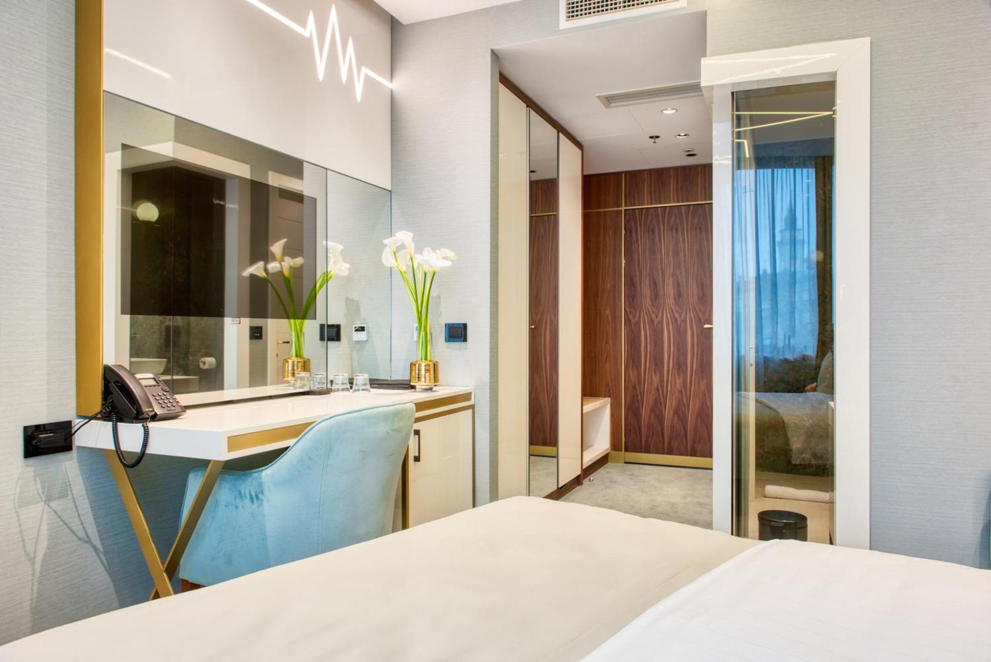 Hotel Pupin Novi Sad Bagian luar foto A room at the hotel