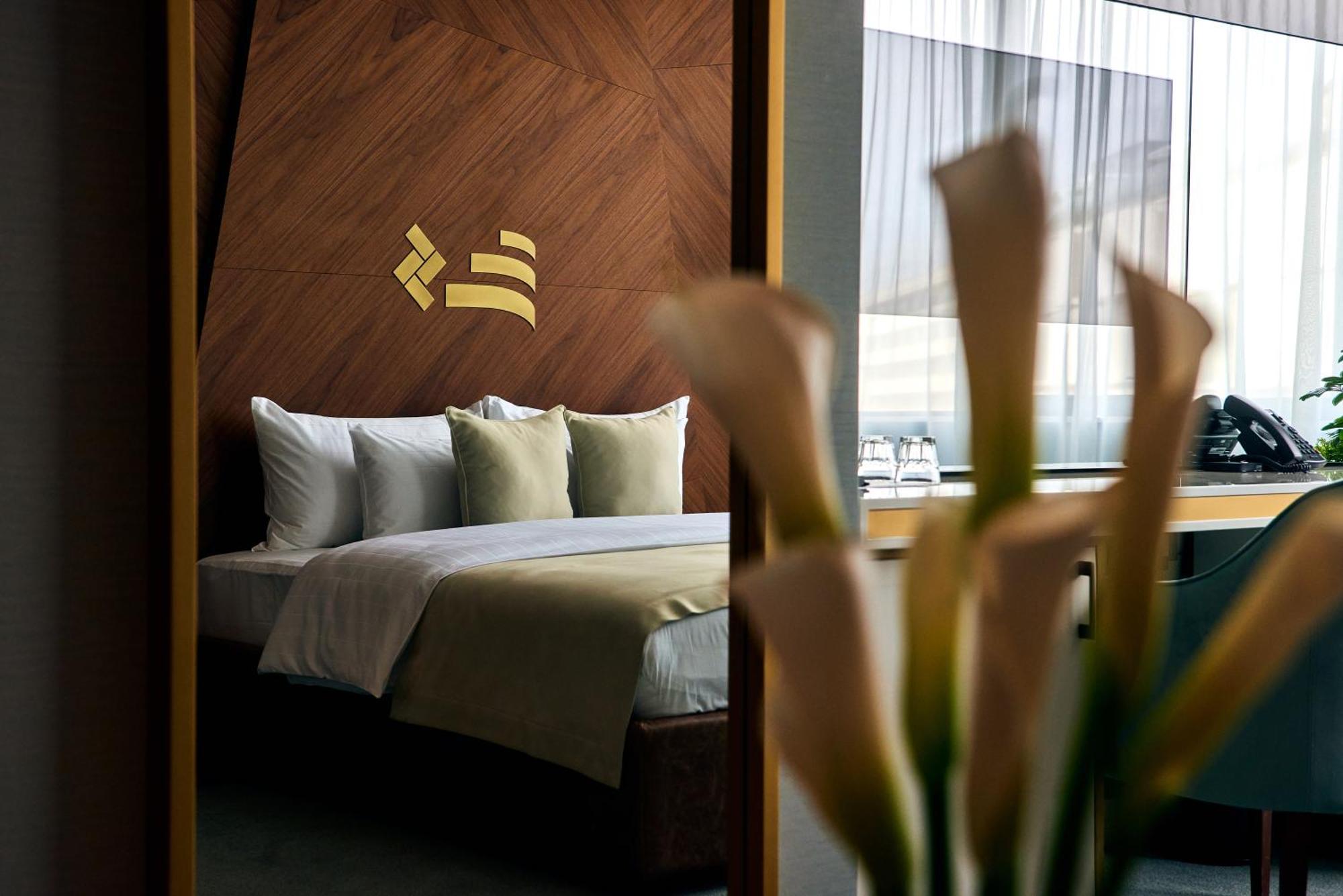 Hotel Pupin Novi Sad Bagian luar foto A room at the hotel