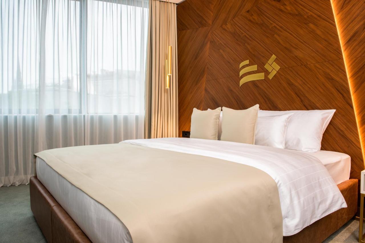Hotel Pupin Novi Sad Bagian luar foto A bedroom at the hotel